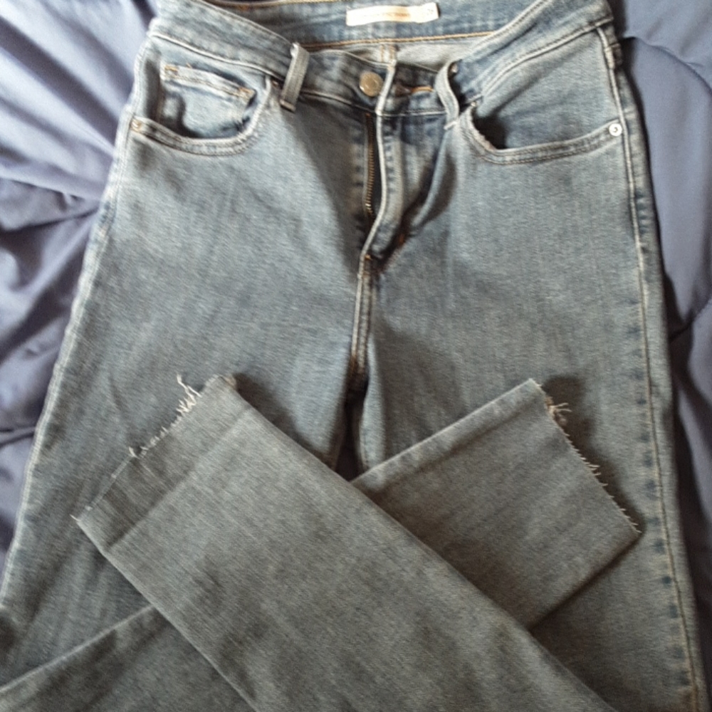 Skinny Levi's 721 with frayed ankles